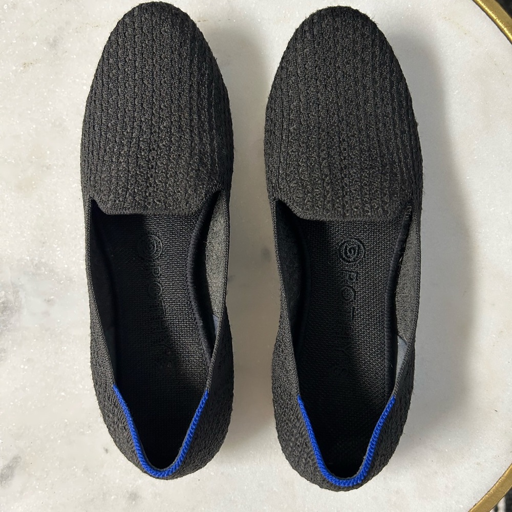 Rothy’s Black Flats size 9. In excellent condition.